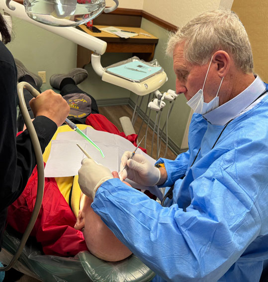 Dr. Gorden with patient